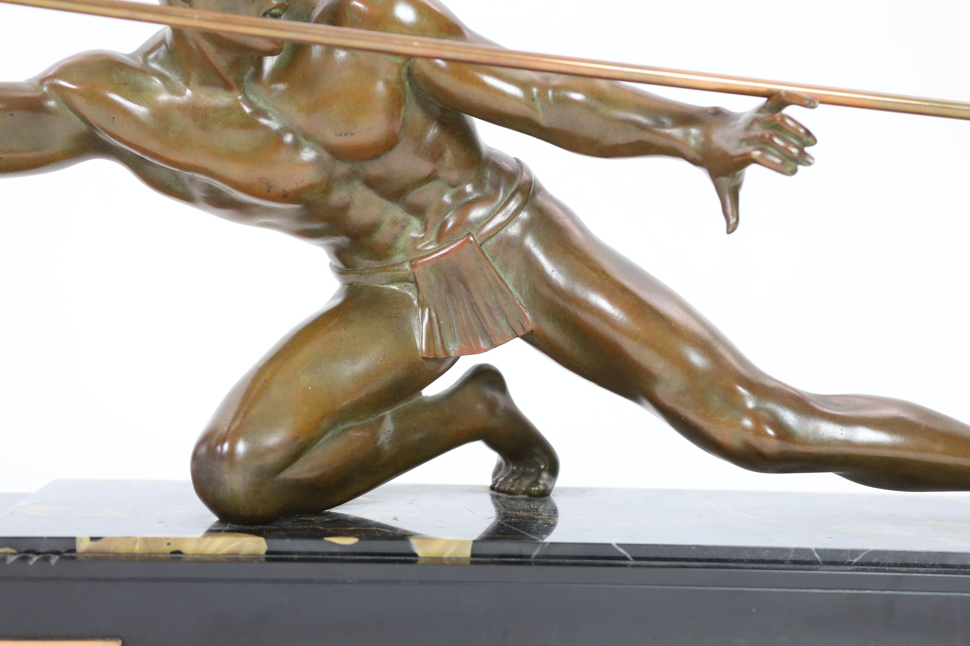 Pierre Joseph Hugonnet. A 1930s French Art Deco bronze model of a spear thrower, length 90cm, height 38cm